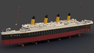 LEGO model of the Titanic ship, with detailed design and iconic yellow smokestacks, against a dark background.